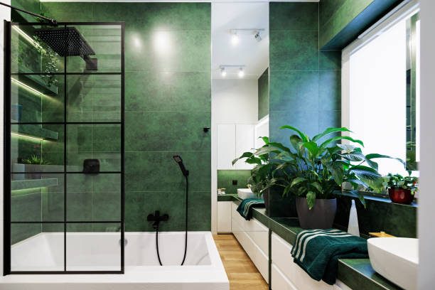 Modern luxury bathroom with green and white tiles